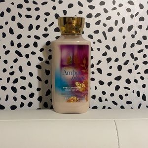 8 OZ bottle of Amber Blush body lotion